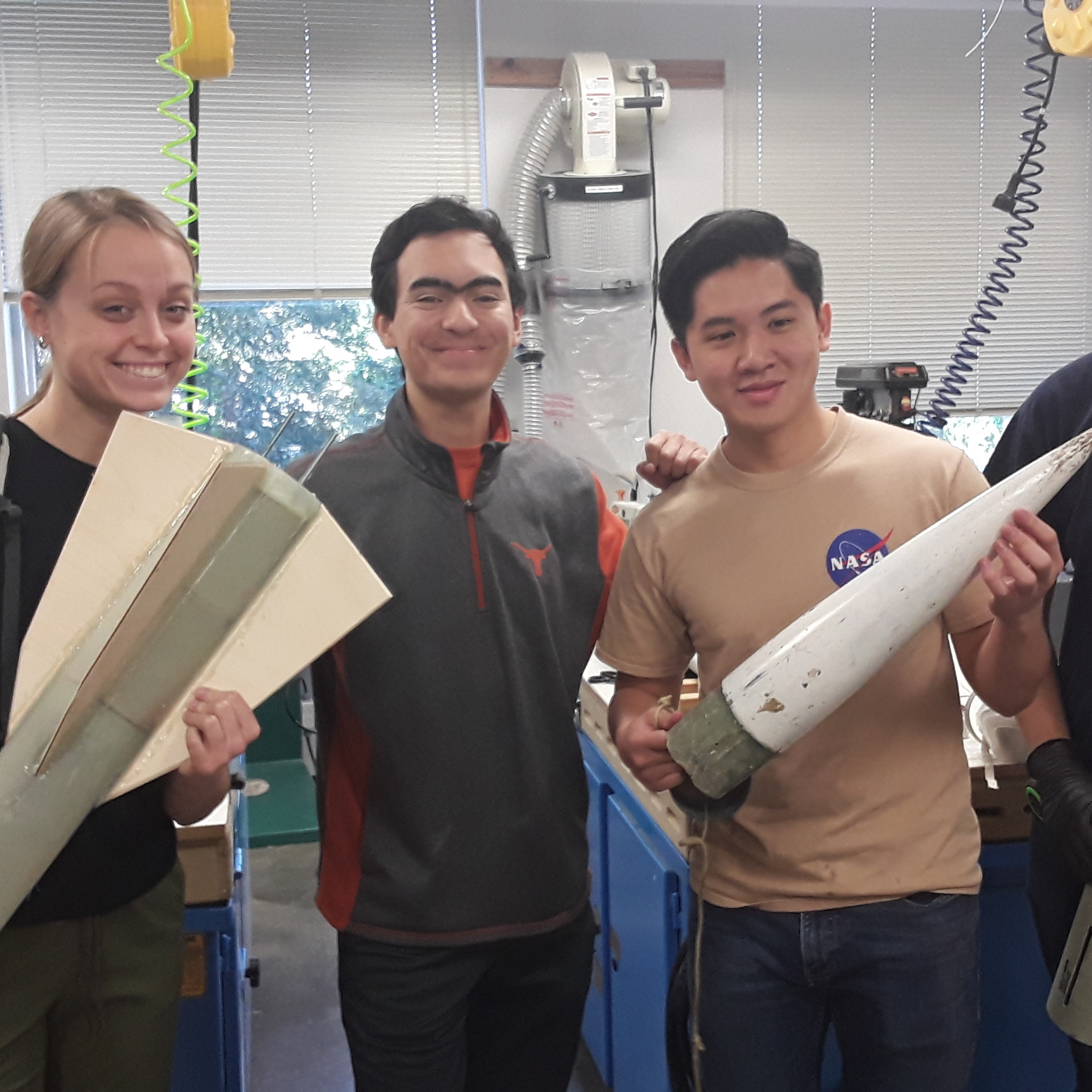 L'SPACE student Alejandro Rincon stands next to Jordan Gilbertson, Dan Huynh, and Michael Evangelista during one of their rocket builds at the University of Texas at Austin.